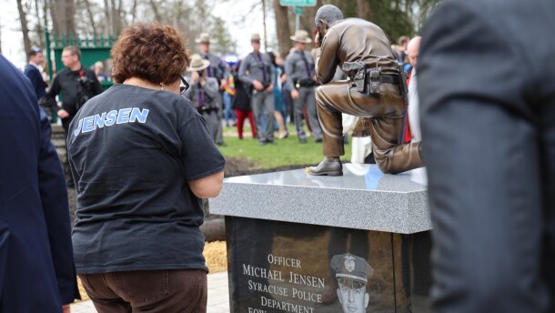 A monument dedicated to Syracuse Police officer Michael Jensen and Onondaga County Sheriff's Lieutenant Michael Hoosock was unveiled on Tipperary Hill Tuesday, April 14, 2026