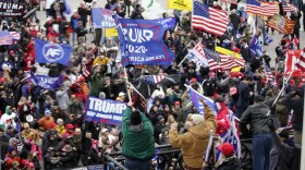 FILE - In this Jan 6, 2021, file photo, violent protesters gather outside the U.S. Capitol in Washington during the deadly insurrection at the U.S. Capitol. (AP Photo/Andrew Harnik, File)