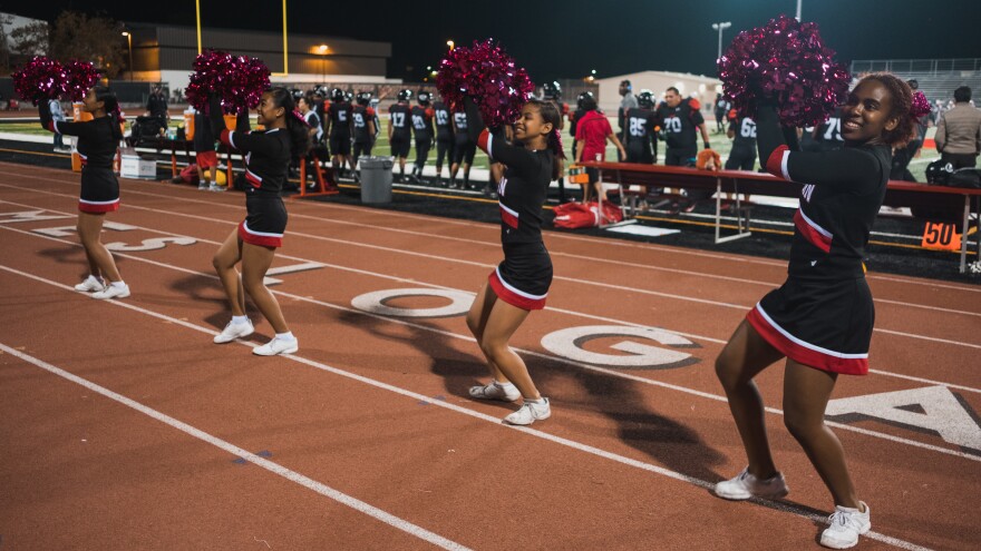 Cheerleaders at James Logan High School in Union City, Calif., perform at a football game.
