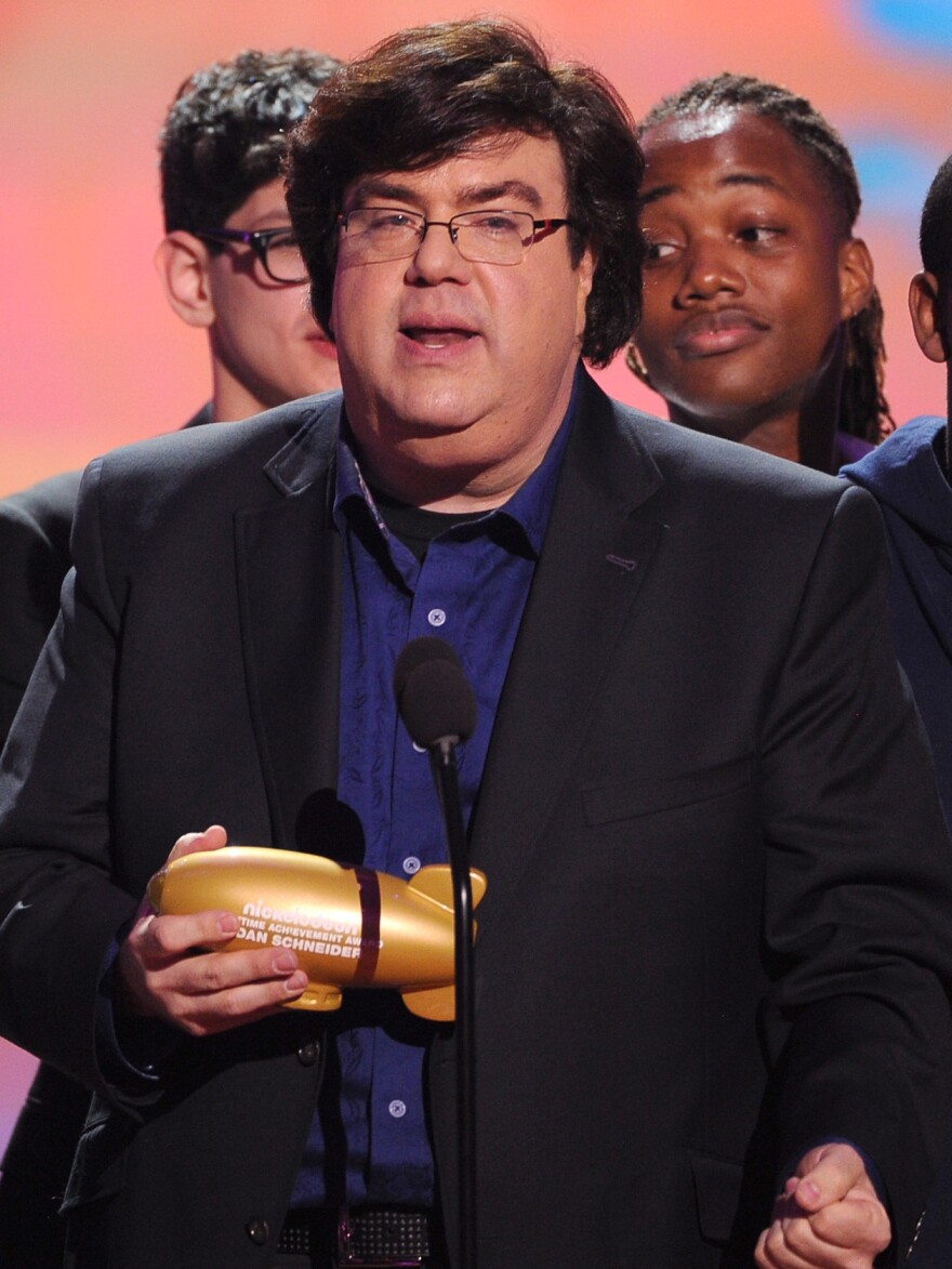 Writer/producer Dan Schneider accepts the Lifetime Achievement Award during Nickelodeon's 27th Annual Kids' Choice Awards in 2014.