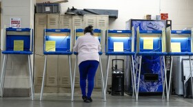 A voter casts her ballot during the Spring election Tuesday, April 2, 2024, in Milwaukee, Wis.