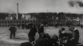The film includes scenes of ordinary Americans going about their daily lives and emphasizes the impact of war here at home. 