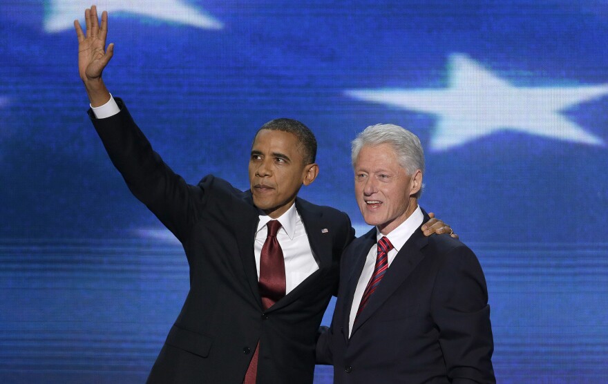 President Barack Obama joins Former President Bill Clinton on stage during the Democratic National Convention in Charlotte, N.C., on Wednesday.