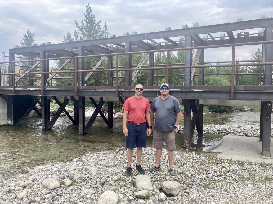 Kurt Tardy and Rob Trahant of the Shoshone-Bannock Fish and Wildlife Department stand in front of the new weir at Pettit Lake.