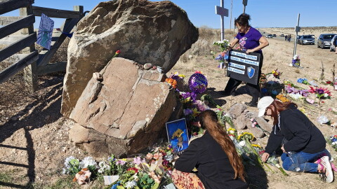 Protesters tend to memorials for Epstein abuse survivors outside the front gate of the sex offender's former Zorro Ranch southeast of Santa Fe. Te site is host to several allegations og abuse going back decades.