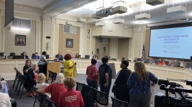 Lexington gun violence survivors stand during Council committee presentation on task force recommendations