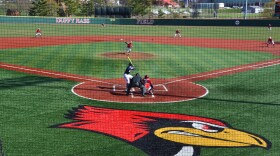 Baseball players at Duffy Bass Field.