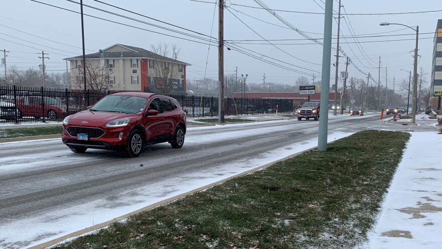 Traffic moves down Main Street in Normal on Thursday, Dec. 22, 2022.