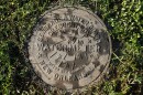 ADVANCE FOR SATURDAY, SEPT. 26, AND THEREAFTER - This Sunday, Jan. 20, 2015, photo, shows a water meter cover in New Orleans. Water rates have been shooting up nationwide in drought-stricken states and in cities trying to upgrade their aging infrastructure. Experts say the trend is sure to accelerate as the cost of water, treatment and delivery comes into line with how essential it is to our daily lives. (AP Photo/Jonathan Bachman)