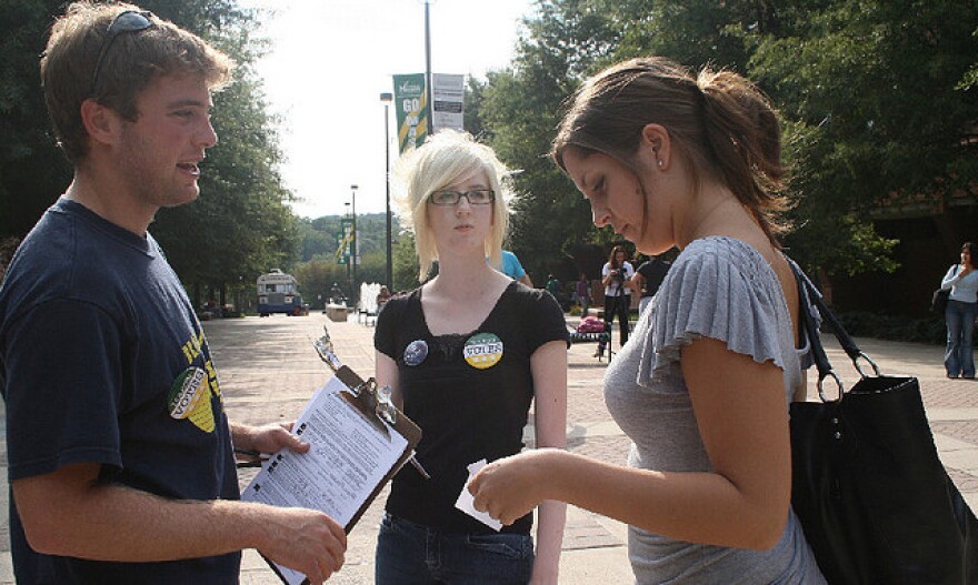 George Mason University students help their peers register to vote in Washington, D.C. Young people in the "other" Washington, on the west coast, have the best access to the political process in the nation, according to a new survey.