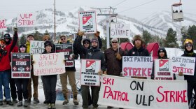Park City Mountain ski patrollers on the picket line New Year's Day, Jan. 1, 2025, in Park City, Utah.