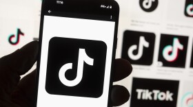 The TikTok logo is seen on a cell phone. (Michael Dwyer/AP)
