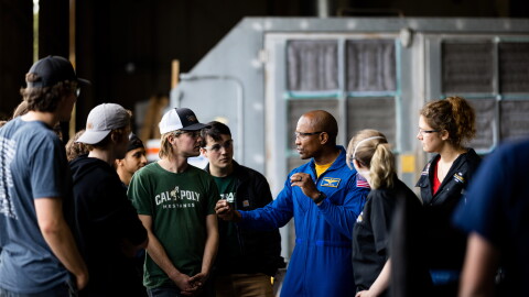 Victor Glover talks with some Cal Poly students.