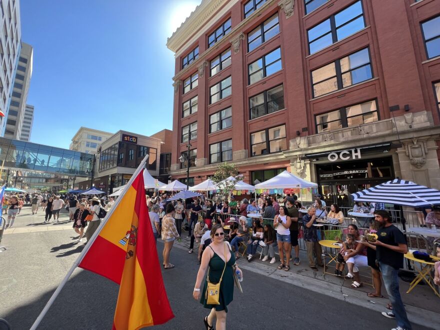 A crowd of people gather along Wall Street to watch a performance at the Tacos y Tequila Festival in downtown Spokane in 2022.