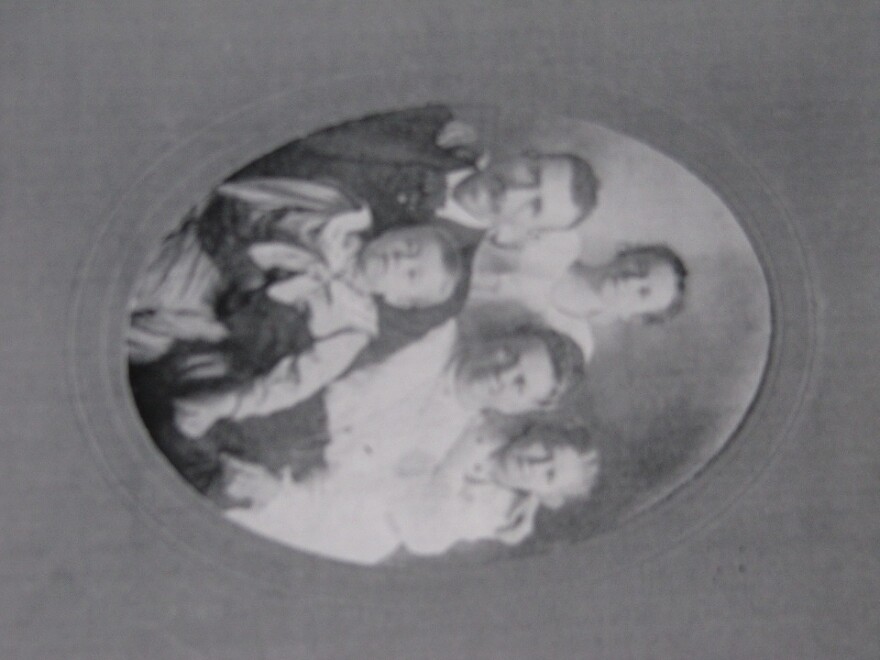 Richard Gunther Johnson as a grown man with his wife and children. At the height of the Civil War, Johnson was sent to a Louisville orphanage after his family was killed in Alabama.