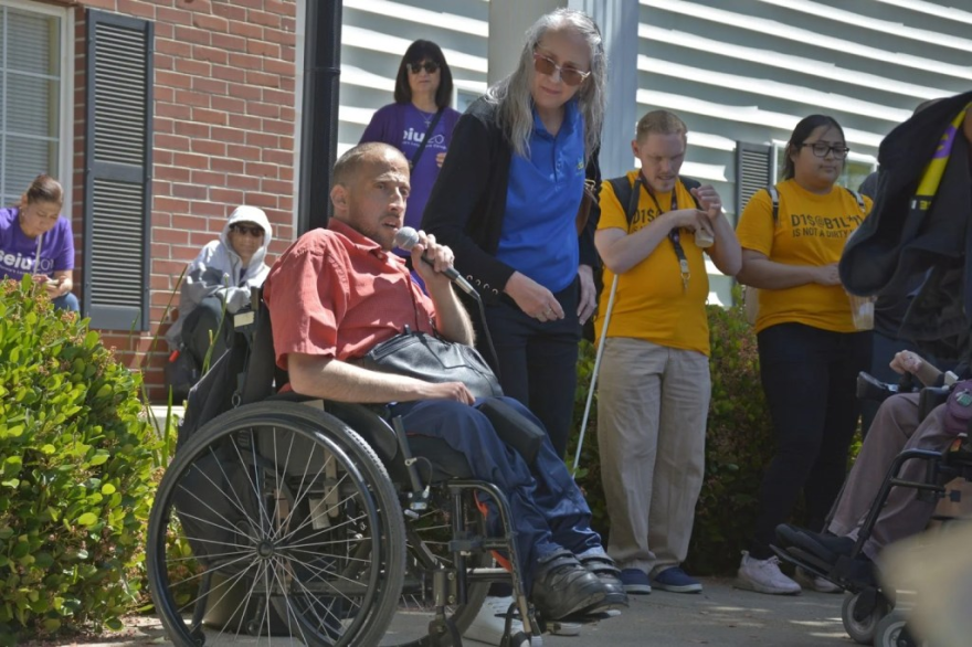 Hughson resident Mohamed Rashid speaks at a Save Medicaid rally in Modesto, Calif. April 23, 2025.