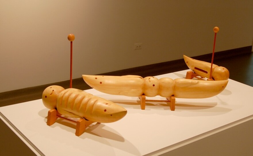 Grab a mallet and start playing music on these wooden caterpillars.