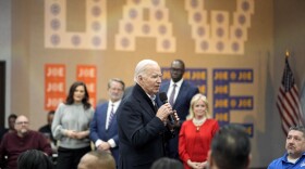 President Joe Biden addresses UAW members during a campaign stop at a phone bank in the UAW Region 1 Union Hall, Thursday, Feb. 1, 2024, in Warren, Mich. Looking on in background are Michigan Gov. Gretchen Whitmer, Sen. Gary Peters, D-Mich., Michigan Lieutenant Governor Garlin Gilchrist and Rep. Debbie Dingell, D-Mich. (AP Photo/Evan Vucci)