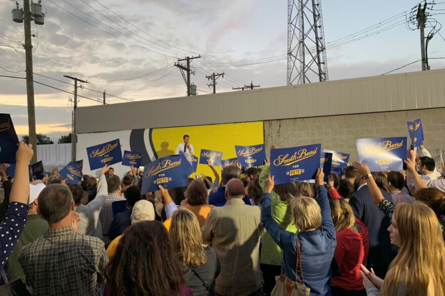 Pete Buttigieg speaks to a crowd in South Bend gathered for the opening of his local presidential campaign office.