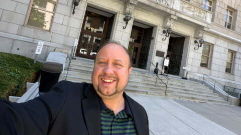 Andrew Tupone in front of the Pennsylvania Capitol in Harrisburg.