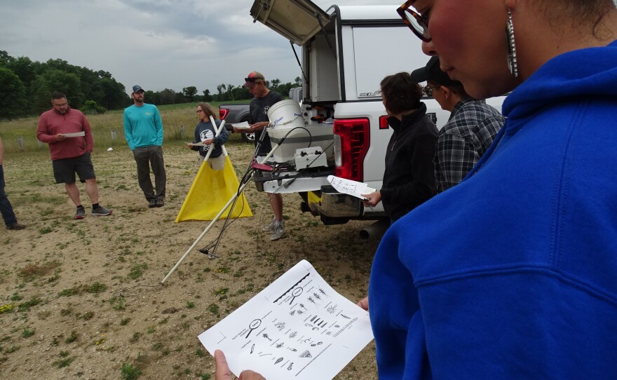 Randy Poelma (center back) with the Ho-Chunk environmental health department introduces trainees to water monitoring equipment and protocols.