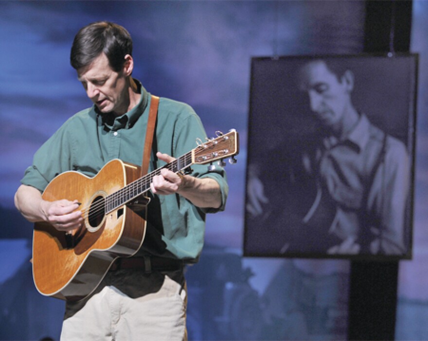 David Lutken performs in “Woody Sez: The Life and Music of Woody Guthrie” at the Arts Theatre, London.