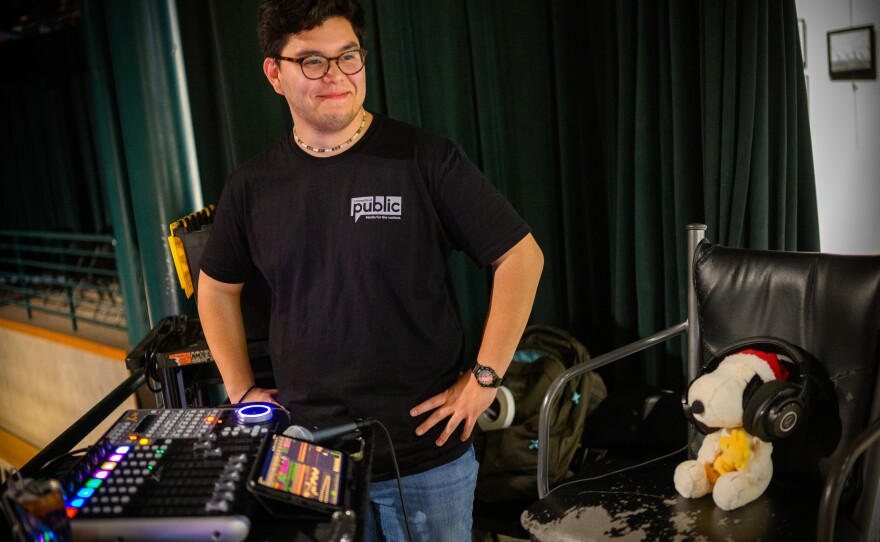 Dylan Reyes reacts to his occupied seat during soundcheck for “Run, Run, Reindeer,” a live taping of the Colin McEnroe Show's Annual Holiday Special on December 04, 2025, at Watkinson School's Foisie Family Amphitheater.