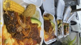 Fish and fungi being sold by Chef Buddy on St. Croix.