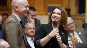 Virginia Del. Carrie Coyner, R-Chesterfield, right, announces that then Del. Mike Mullen, D-Newport News, has offered to shave his mustache for charity during the House session at the Capitol Wednesday Feb. 16, 2022, in Richmond, Va.