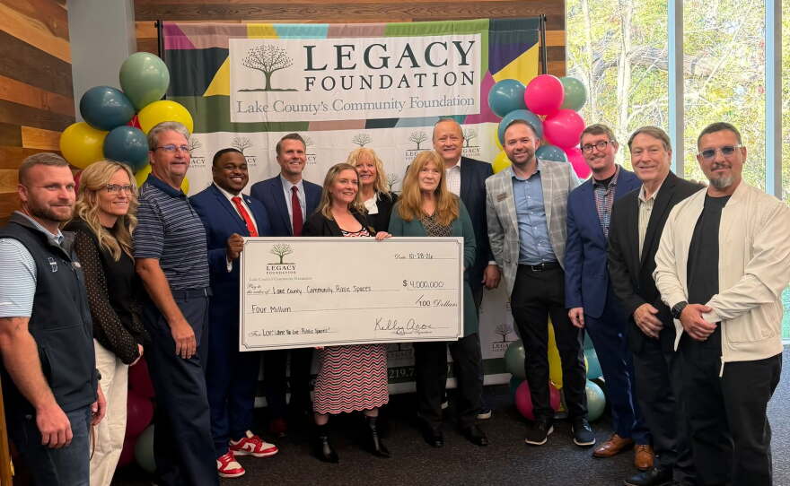 Representatives from the seven organizations awarded the "Love Where You Live" grant.