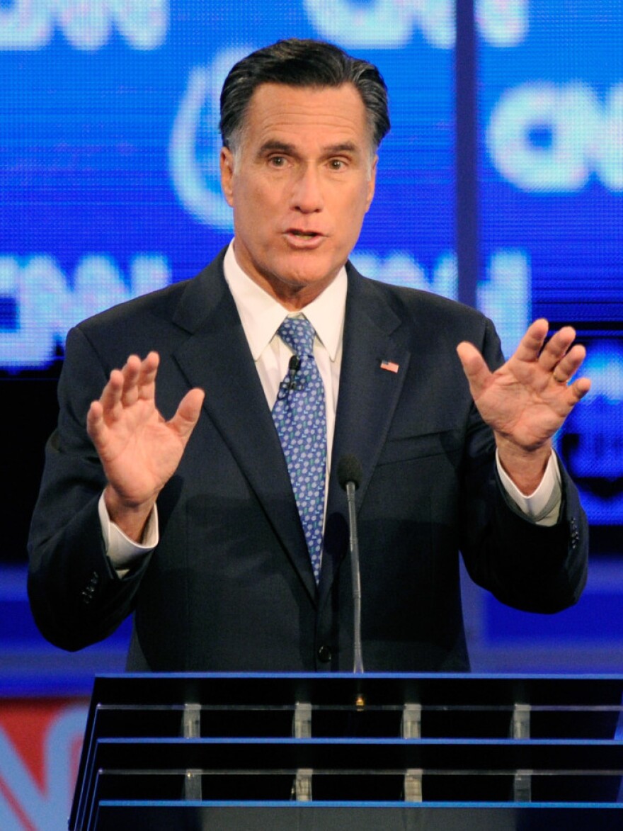 <p>Former Massachusetts Gov. Mitt Romney defended his faith in the Republican presidential debate Tuesday night in Las Vegas. </p>