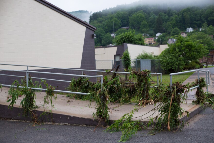 A ramp outside Richwood Middle School is garnished with floodwater debris.
