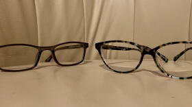 eyeglasses placed on yellow chair