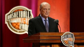 NCAA adminstrator Tom Jernstedt speaks during his enshrinement into the Naismith Memorial Basketball Hall of Fame on Friday, Sept. 8, 2017, in Springfield, Mass.
