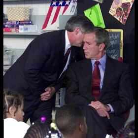 In this Tuesday, Sept. 11, 2001, WUSF file photo, Chief of Staff Andy Card whispers into the ear of President George W. Bush to give him word of the plane crashes into the World Trade Center, during a visit to the Emma E. Booker Elementary School in Sarasota.