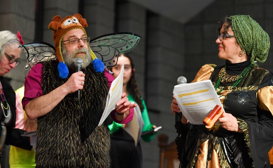 Rabbi Daniel Swartz and Rabbi Marjorie Berman act out a scene as Flying Hamonkey and Madame Xeresh during a Purim skit.