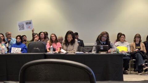 CMS Superintendent Crystal Hill talks about the recent Border Patrol deployment in Charlotte as some hold signs protesting immigration enforcement.