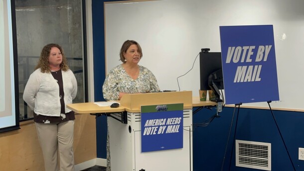 Christine Corba from the League of Women Voters of the Greater Dayton Area speaks at a press conference about the launch of a media campaign promoting the importance of mail-in voting on Wednesday, April 15.