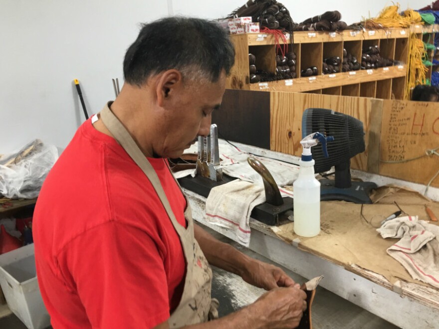 Martin Gomez has worked at Nokona for 19 years. He is considered a master at making these baseball gloves.