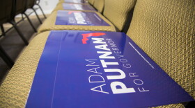 Adam Putnam campaign signs await Southwest Florida Republicans on the seats at the Lee County Republican Party debate watch party Aug. 8.