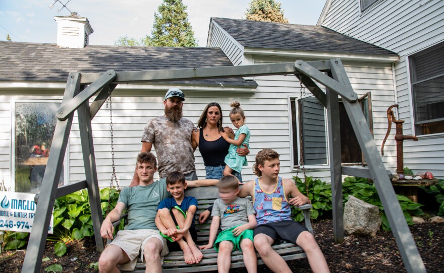 The Maglothin family sits for a portrait at their home in Waterford, Mich. (Clockwise from top left: Glenn, 37; Kate, 36; Nova, 3; Caiden, 12; Finn, 7; William, 8; and Cody, 18)