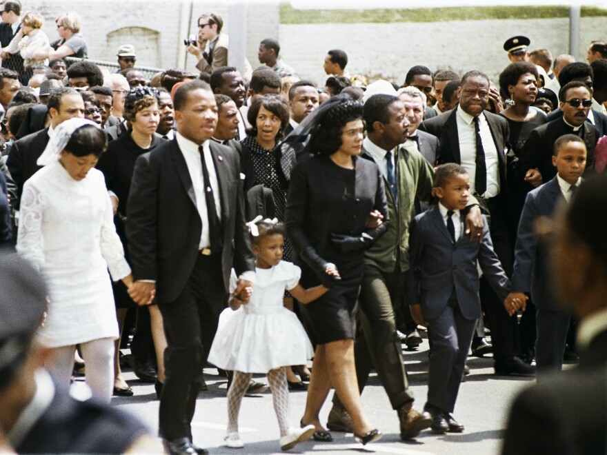 The family of slain civil rights leader Martin Luther King Jr., walk in the funeral procession in Atlanta on April 9, 1968. From left: daughter Yolanda, 12; King's brother A.D. King; daughter Bernice, 5; widow Coretta Scott King; Rev. Ralph Abernathy; sons Dexter, 7, and Martin Luther King III, 10.