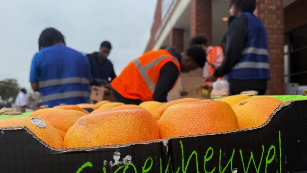 Students at Voorhees University in Demark, South Carolina, work at Thursday afternoon's food drive. Beets and potatoes were some produce items available.
