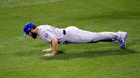 Jake Arrieta doing push-ups.