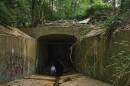 Hydrologist Bob Criss stands in the entrance to the tunnel where the River Des Peres begins its underground descent. 