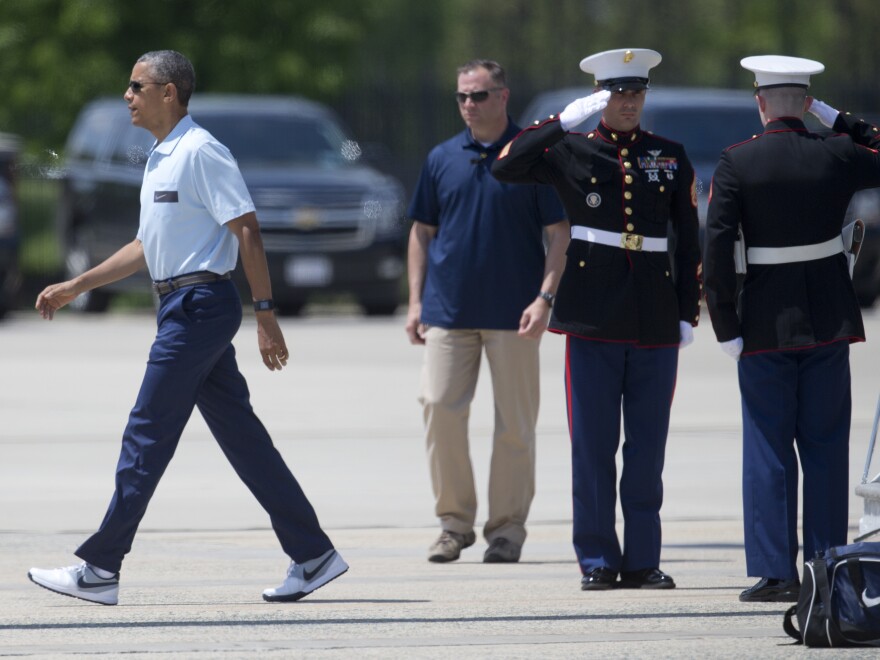 President Obama walks away from Marine One in his Nikes on Sunday. He heads to Nike Headquarters later this week.