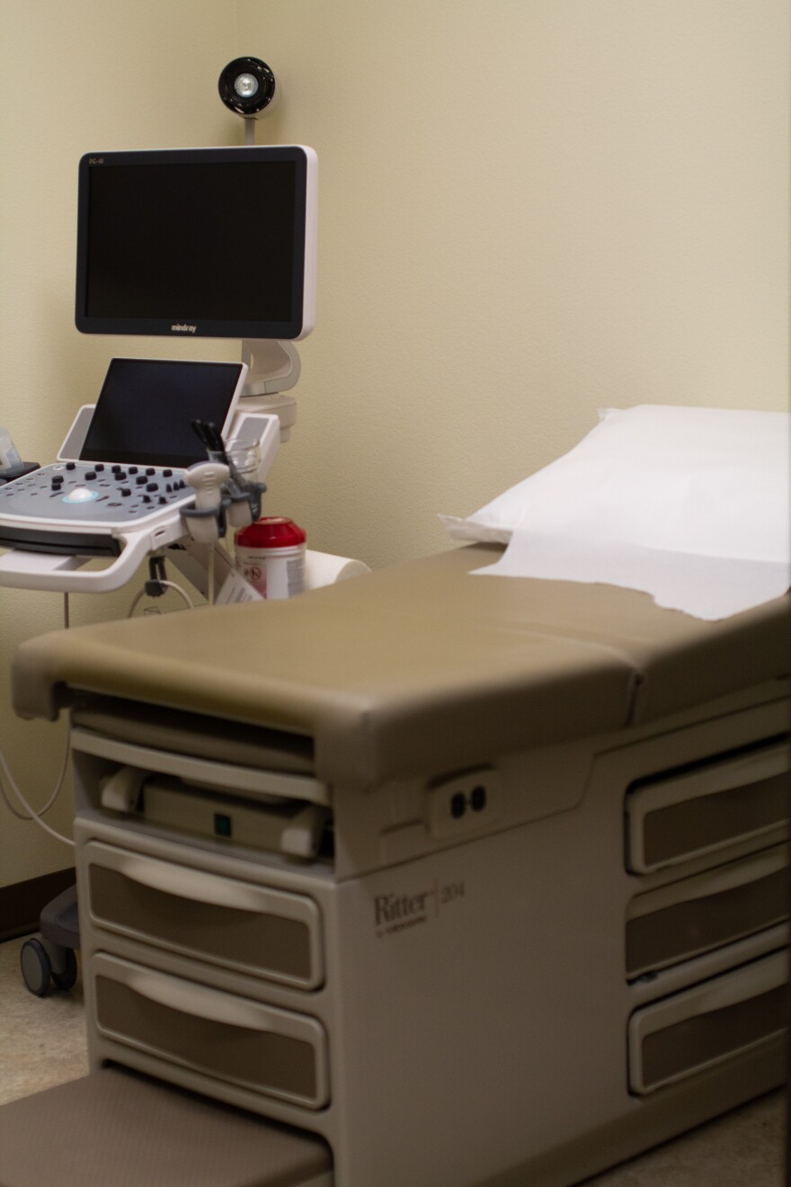 An ultrasound machine sits beside an exam table at WISH Medical in Moscow. Photo by Rachel Sun