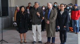 From left, Gisela Perez Kusakawa, executive director of the Asian American Scholar Forum, Haipei Shue, president of United Chinese Americans, Peter Zeidenberg, Franklin Tao’s criminal defense attorney, and Tao’s wife, Hong Peng, appear in 2023 outside of the Robert J. Dole Federal Courthouse in Kansas City, Kansas. They spoke after Tao was sentenced following a criminal convictions of making a false statement, which was eventually overturned. “We will as a community fight for the equal treatment of Chinese Americans going forward,” Shue said.
