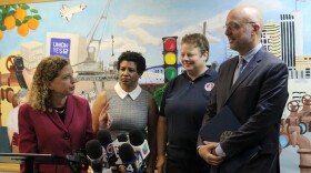 Democratic U.S. Reps Debbie Wasserman-Schultz and Ted Deutch support furloughed South Florida HUD workers Denise Benjamin and Peggy Johannsen in Plantation on Tuesday, Jan. 8, 2019. 