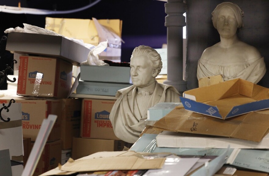 Busts of Hiram and Elizabeth Sibley sit among miscellaneous items at the Rochester Historical Society on University Avenue.